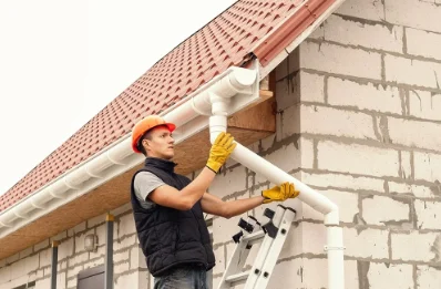 Pose et remplacement de gouttières à Tresses